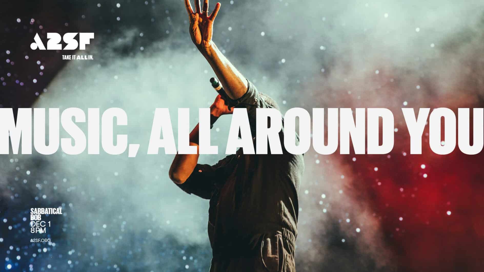 A singer performs passionately on stage, hand raised against a vibrant smoky backdrop. Bold text reads "Music, All Around You." The mood is dynamic and captivating.