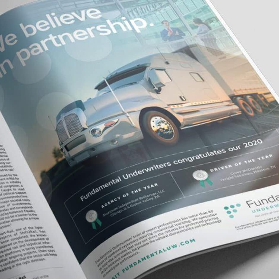 A magazine ad features a large white semi-truck under a headline, "We believe in partnership." It conveys a professional tone, with award mentions for "Agency of the Year" and "Driver of the Year" by Fundamental Underwriters.